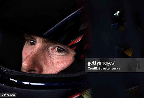 Scott Speed sits in the Jordan's Truck Sales Ford before the start of practice for the NASCAR Sprint Showdown at Charlotte Motor Speedway on May 18,...