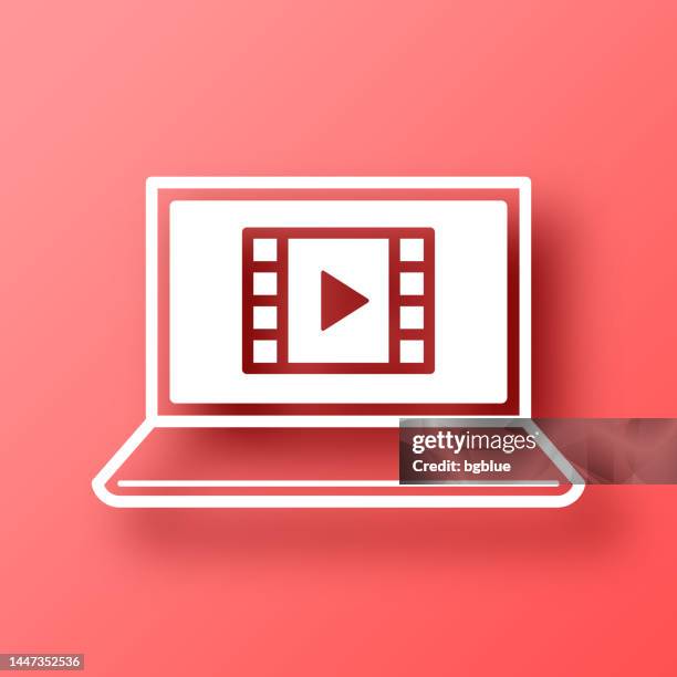 watch video on laptop. icon on red background with shadow - netflix stock illustrations