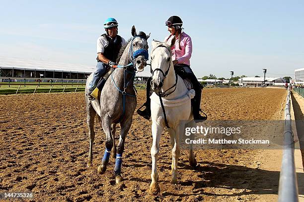 Creative Cause, riden by John Cisneros, is lead off the track by Ciara McMurtrie during the morning excercise session in preparation for the 137th...