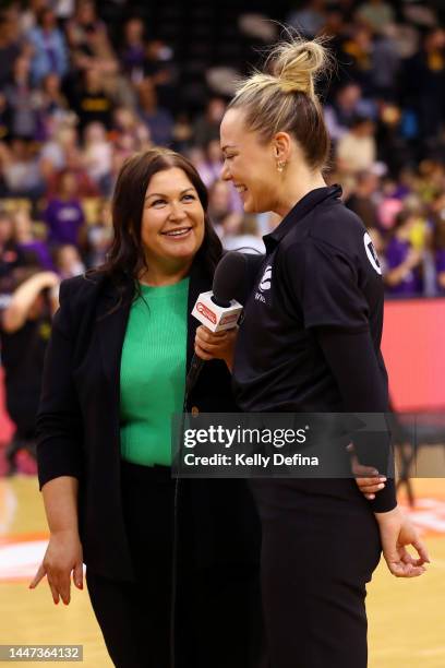 Megan Hustwaite, Sports Commentator and Sideline Reporter, interviews Tess Madgen of the Boomers during the round five WNBL match between Melbourne...