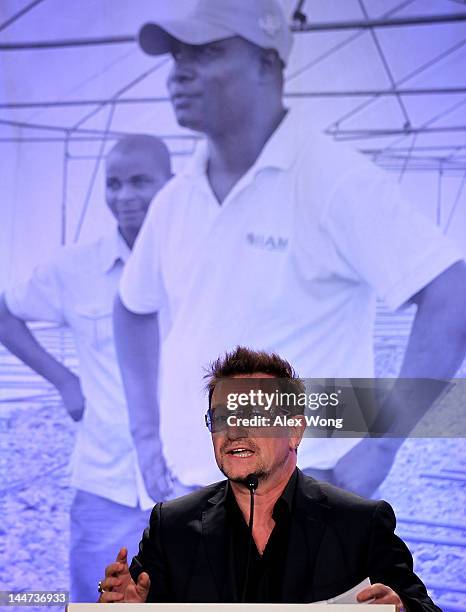 Bono, U2 lead singer and cofounder of ONE, speaks during the Symposium on Global Agriculture and Food Security May 18, 2012 at the Ronald Reagan...