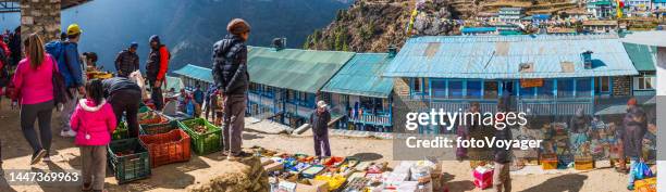 sherpa people market day namche bazaar panorama himalaya mountains nepal - namche bazaar stock pictures, royalty-free photos & images