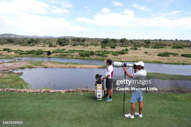 Adrian Otaegui of Spain takes pictures of the Kruger National game reserve as he plays a practice round ahead of the Alfred Dunhill Championship at...