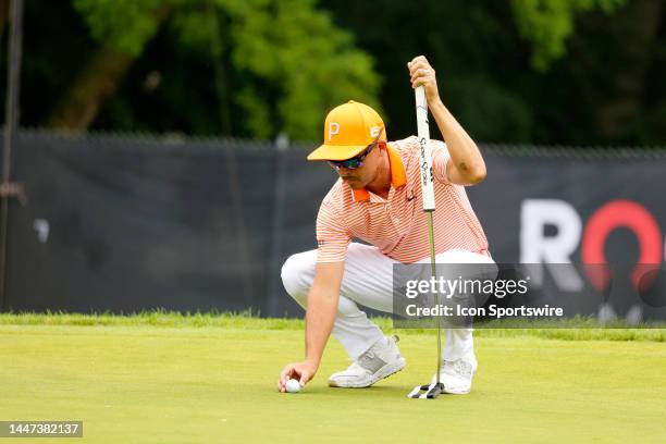 Golfer Rickie Fowler putts on the 7th hole on July 2 during the final round of the Rocket Mortgage Classic at the Detroit Golf Club in Detroit,...