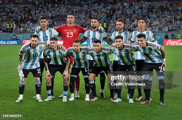 The Argentina team line up, back row l-r, Cristian Romero, Emiliano Martinez, Nicolas Otamendi, Alexis MacAllister, Nahuel Molina, front row l-r,...