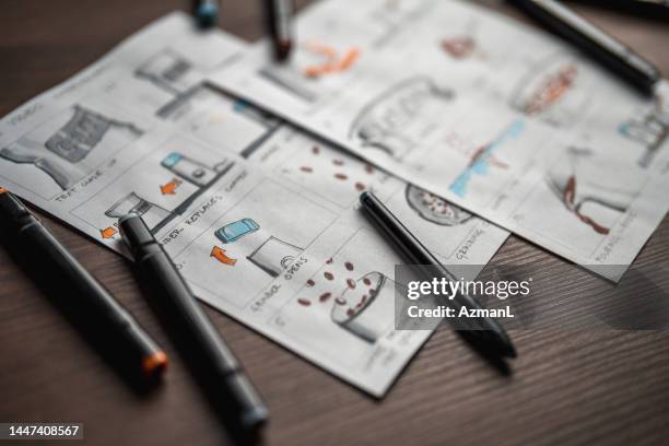 storyboard and colored pencils on the table - storyboard cinema stock pictures, royalty-free photos & images