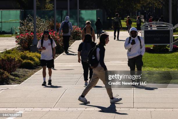 Students walk the campus of Farmingdale State College, located in East Farmingdale, New York on November 3, 2022.