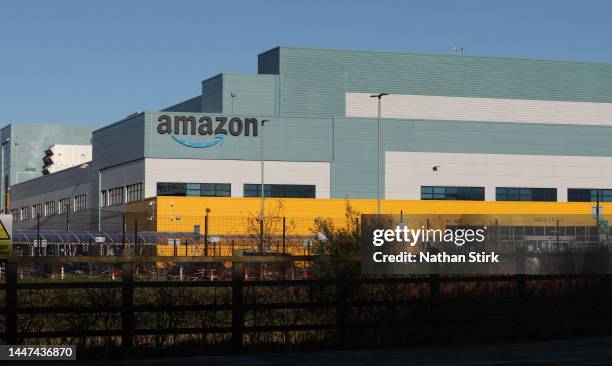 The Amazon logo is displayed outside the Amazon UK Services Ltd Warehouse on December 07, 2022 in Warrington, England .