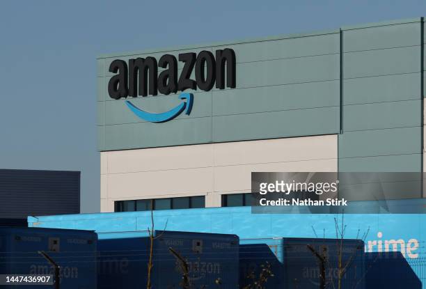 The Amazon logo is displayed outside the Amazon UK Services Ltd Warehouse on December 07, 2022 in Warrington, England .