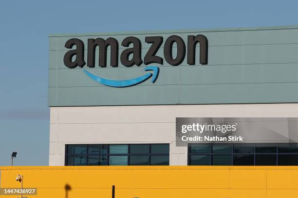 The Amazon logo is displayed outside the Amazon UK Services Ltd Warehouse on December 07, 2022 in Warrington, England .