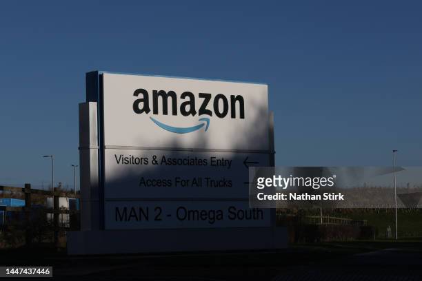 The Amazon logo is displayed outside the Amazon UK Services Ltd Warehouse on December 07, 2022 in Warrington, England .
