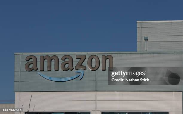 The Amazon logo is displayed outside the Amazon UK Services Ltd Warehouse on December 07, 2022 in Warrington, England .