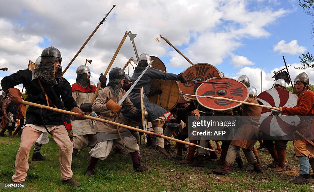 Viking-era re-enactors take part in a st