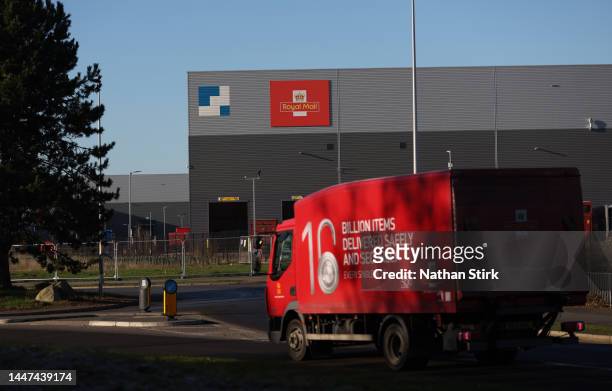 Royal Mail lorry drives past the Warrington Royal Mail Centre on December 07, 2022 in Warrington, England .