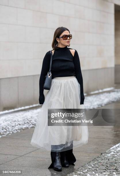 Amelie Stanescu wears - Helmut Lang knit long sleeve top, Arket organza skirt, InWear suit pants, Julia Skergerth bag, Miu miu sunglasses on December...