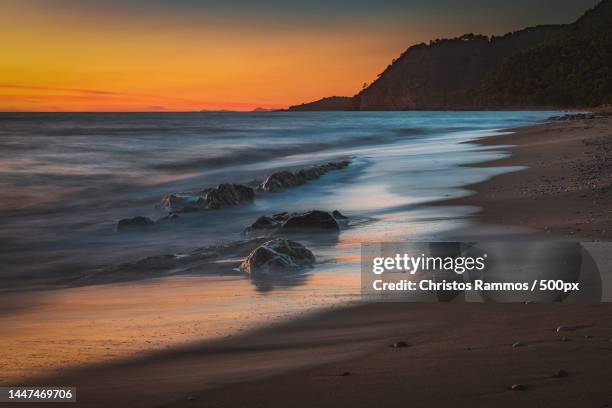 scenic view of sea against sky during sunset,parga,greece - epirus greece stock pictures, royalty-free photos & images