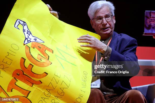 Italian novelist Francesco D’Adamo autographs his book 'Giuditta e l’orecchio del diavolo' as he receives the "Premio Strega Ragazze E Ragazzi" at...