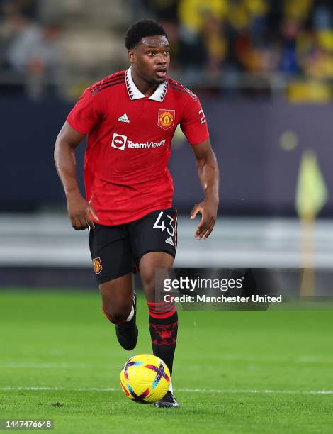 Teden Mengi of Manchester United in action during the friendly match between Cadiz CF and Manchester United at Nuevo Mirandilla on December 07, 2022...