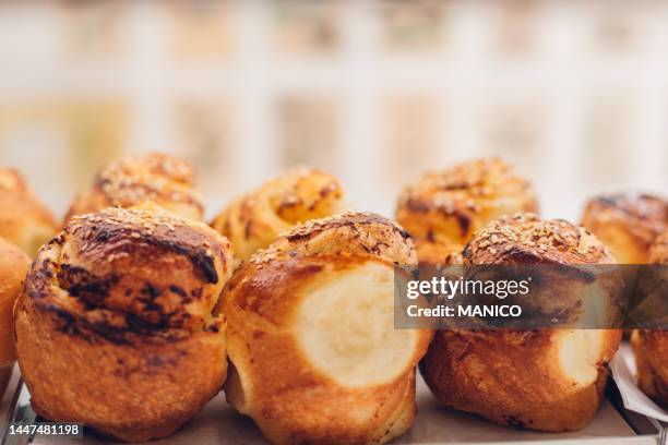 pasties in bakery - boulangerie vitrine stock pictures, royalty-free photos & images