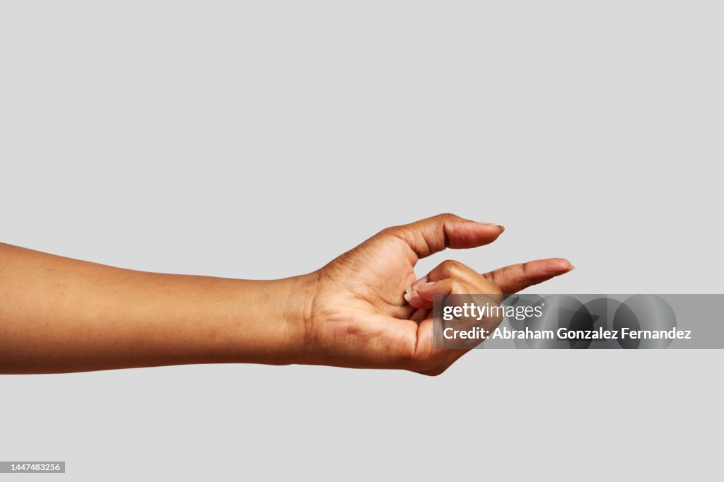 African hand pointing in front of it