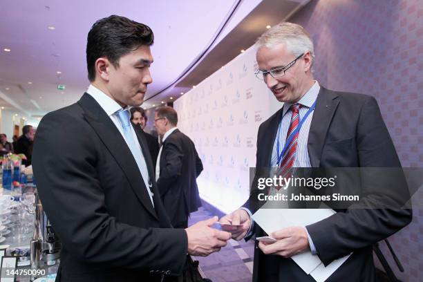 Rick Yune and Bernd Doepke attend the third day of the CGDC Annual Meeting on May 18, 2012 in Vienna, Austria. The Center for Global Dialogue and...