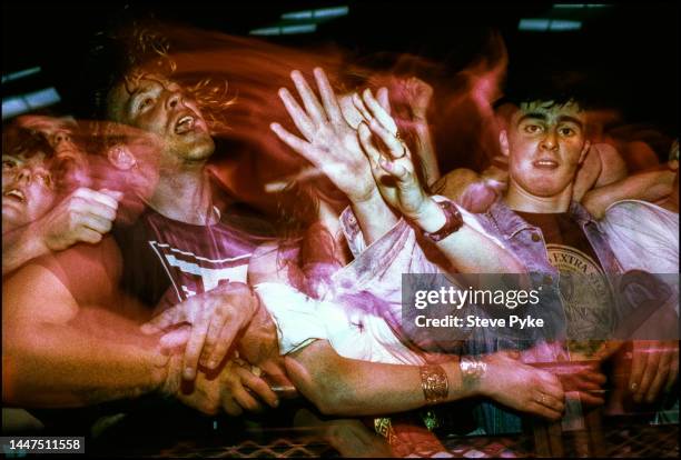 Fans of the grunge band Nirvana in the crowd at a gig in Belfast 1992.