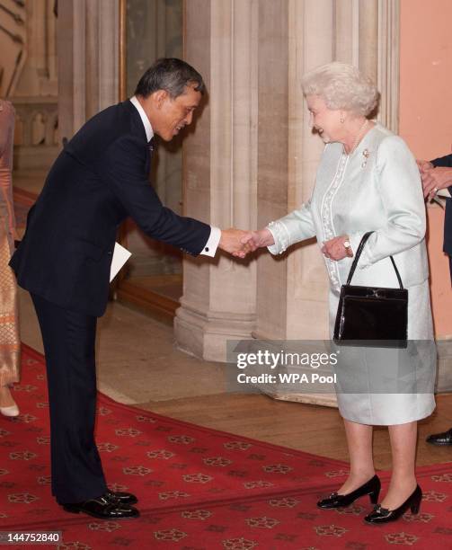 The the Crown Prince of Thailand Maha Vajiralongkorn is greeted by Queen Elizabeth II at lunch For Sovereign Monarchs in honour of Queen Elizabeth...