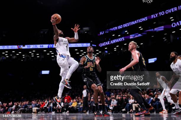 Kyrie Irving of the Brooklyn Nets goes up for a layup during the second quarter of the game against the Charlotte Hornets at Barclays Center on...