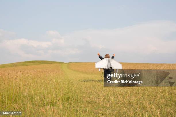 young business boy in jetpack - rocket pack stock pictures, royalty-free photos & images