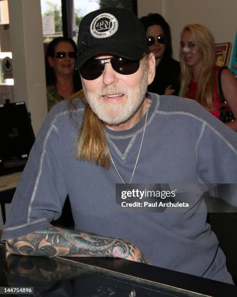 Musician Gregg Allman signs copys of his new book "My Cross To Bear" at Book Soup on May 17, 2012 in West Hollywood, California.