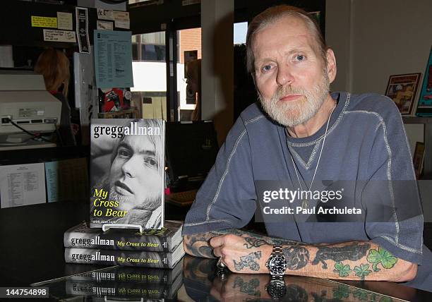 Musician Gregg Allman signs copys of his new book "My Cross To Bear" at Book Soup on May 17, 2012 in West Hollywood, California.