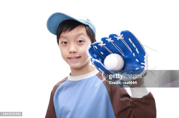 cute boy holding a baseball bat - kids baseball catcher stock pictures, royalty-free photos & images