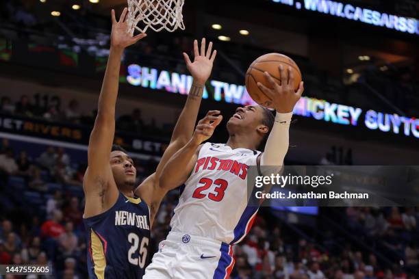 Jaden Ivey of the Detroit Pistons shoots against Trey Murphy III of the New Orleans Pelicans during the second half at the Smoothie King Center on...