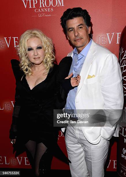 Singer Cyndi Lauper and David Thornton arrive at The RED Party in Cannes featuring Cyndi Lauper at VIP Rooms at The JW Marriott on May 18, 2012 in...