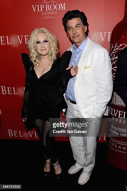 Singer Cyndi Lauper and David Thornton arrive at The RED Party in Cannes featuring Cyndi Lauper at VIP Rooms at The JW Marriott on May 18, 2012 in...