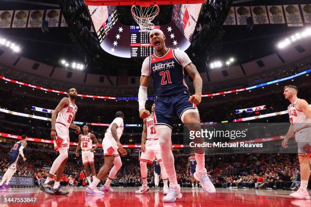 Daniel Gafford of the Washington Wizards celebrates a dunk against the Chicago Bulls during the second half at United Center on December 07, 2022 in...