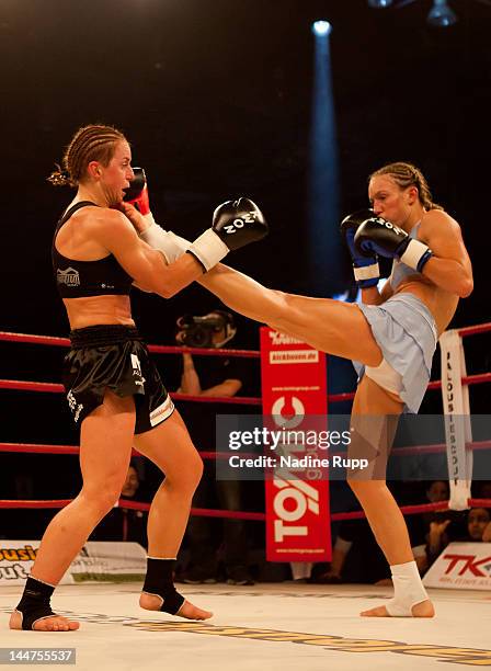 German kickboxer Christine Theiss fights against Ania Fucz of Germany during the WKA middleweight world title fight at Olympia Eishalle on May 18,...