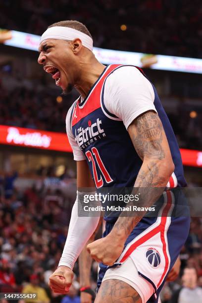 Daniel Gafford of the Washington Wizards celebrates a dunk against the Chicago Bulls during the second half at United Center on December 07, 2022 in...