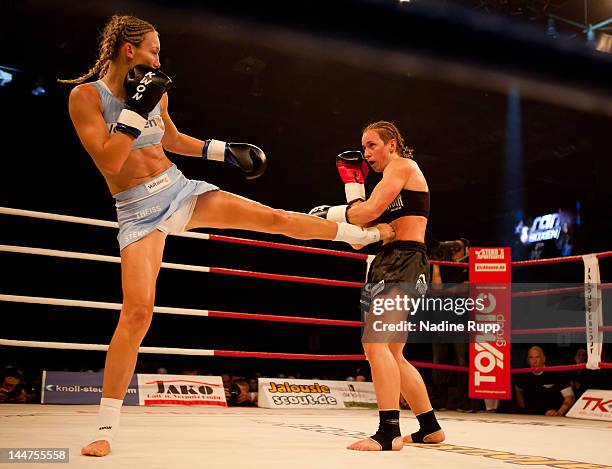 German kickboxer Christine Theiss fights against Ania Fucz of Germany during the WKA middleweight world title fight at Olympia Eishalle on May 18,...