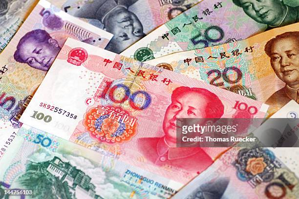 renminbi - images of chinese yuan banknotes stock pictures, royalty-free photos & images