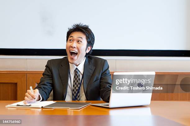 japanese business man - portrait of business man looking surprised stock-fotos und bilder