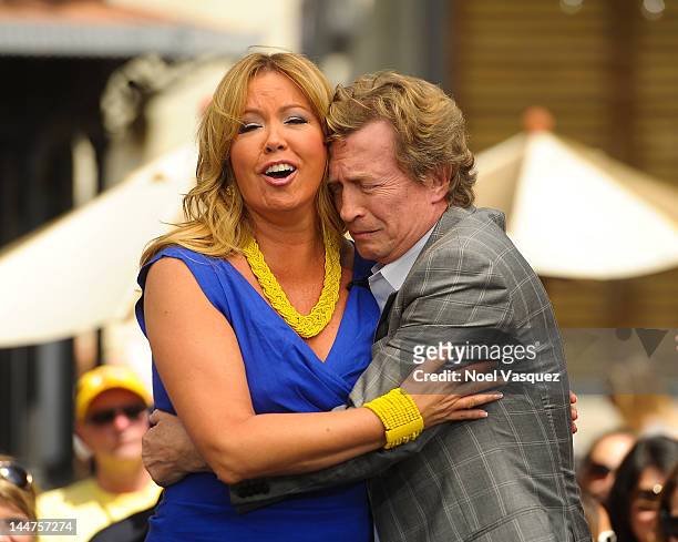 Nigel Lythgoe and Mary Murphy visit "Extra" at The Grove on May 18, 2012 in Los Angeles, California.