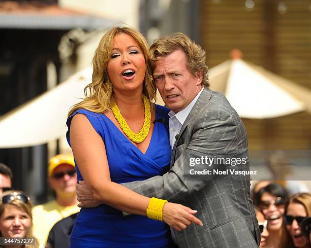 Nigel Lythgoe and Mary Murphy visit "Extra" at The Grove on May 18, 2012 in Los Angeles, California.