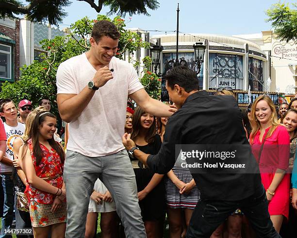 Kris Humphries and Mario Lopez visit "Extra" at The Grove on May 18, 2012 in Los Angeles, California.