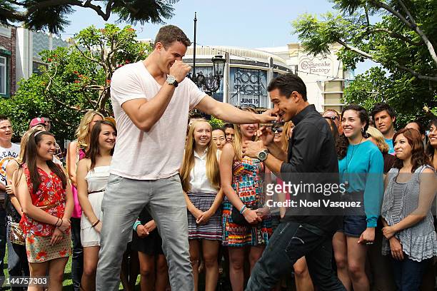 Kris Humphries and Mario Lopez visit "Extra" at The Grove on May 18, 2012 in Los Angeles, California.