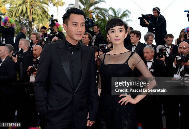 Yang Mi and guest attend the "Madagascar 3: Europe's Most Wanted" Premiere during the 65th Annual Cannes Film Festival at Palais des Festivals on May...