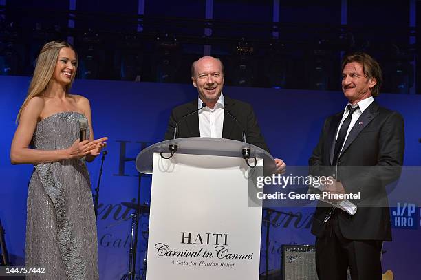 Petra Nemcova, actor Paul Haggis and Sean Penn speak onstage at the Haiti Carnival in Cannes Benefitting J/P HRO, Artists for Peace and Justice &...