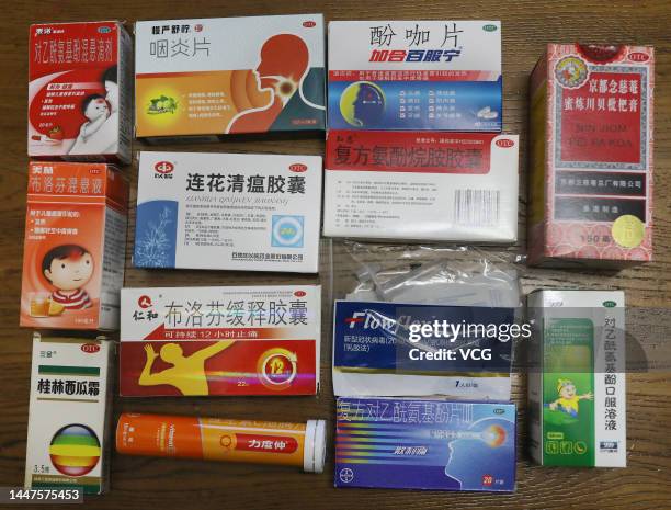 Boxes of Lianhua Qingwen capsules, COVID-19 antigen rapid test kits, anti-inflammatory drug Ibuprofen and other common cold medicines are seen at a...