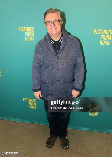 Nathan Lane poses at a photo call for the new broadway play "Pictures from Home" at The Yancey Richardson Gallery on December 7, 2022 in New York...