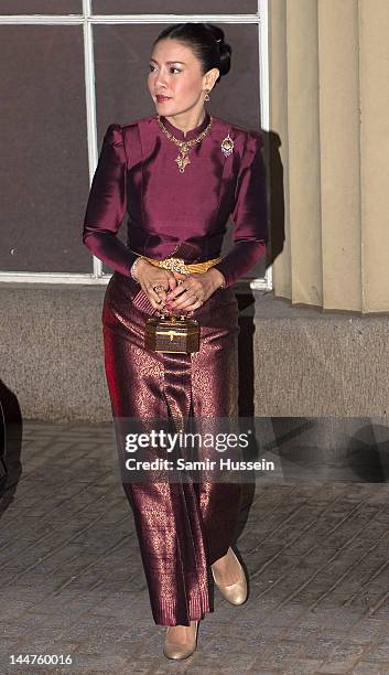 Princess Srirasm of Thailand attend a dinner for foreign Sovereigns to commemorate the Diamond Jubilee at Buckingham Palace on May 18, 2012 in...